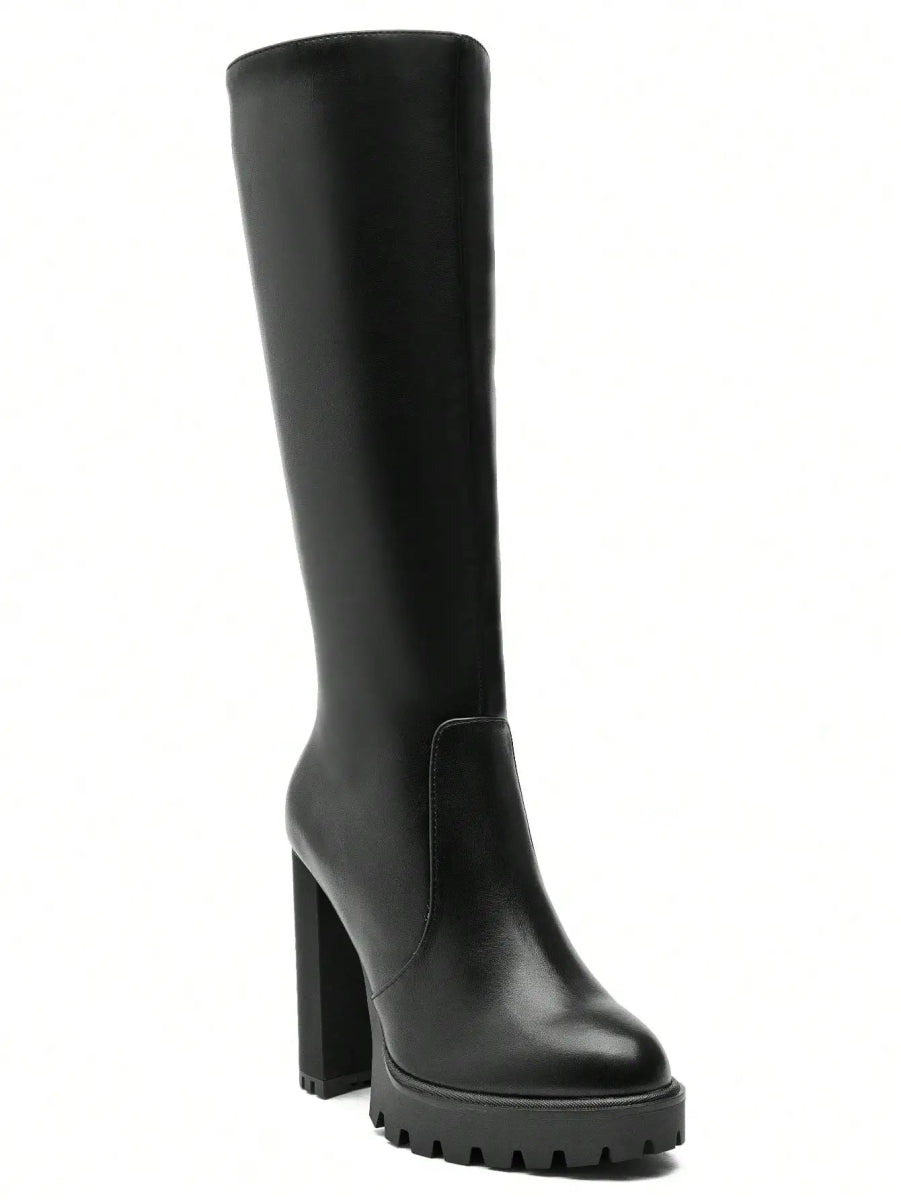 Bottes à talon haut épais et semelle crantée noires - RIVE GAUCHE