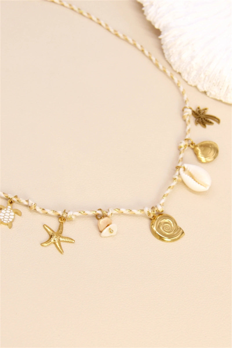 Collier charmes coquillages - RIVE GAUCHE