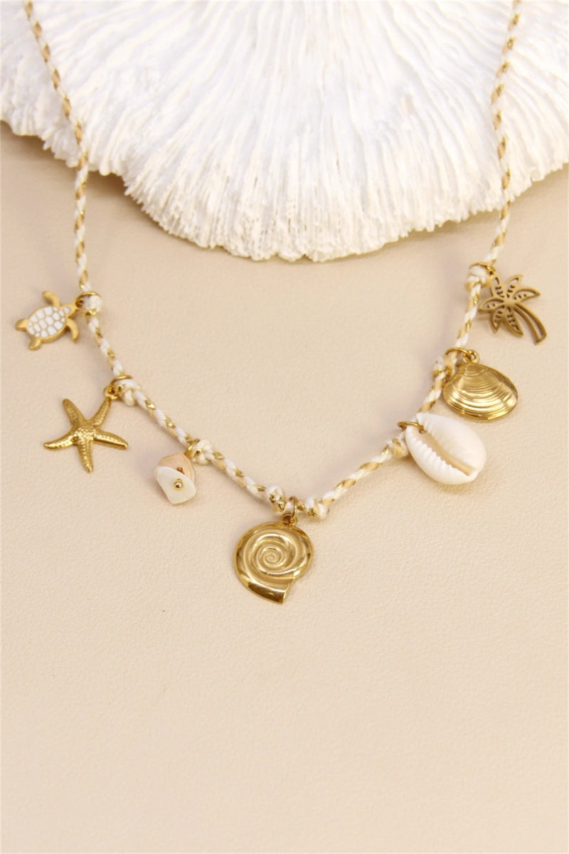Collier charmes coquillages - RIVE GAUCHE