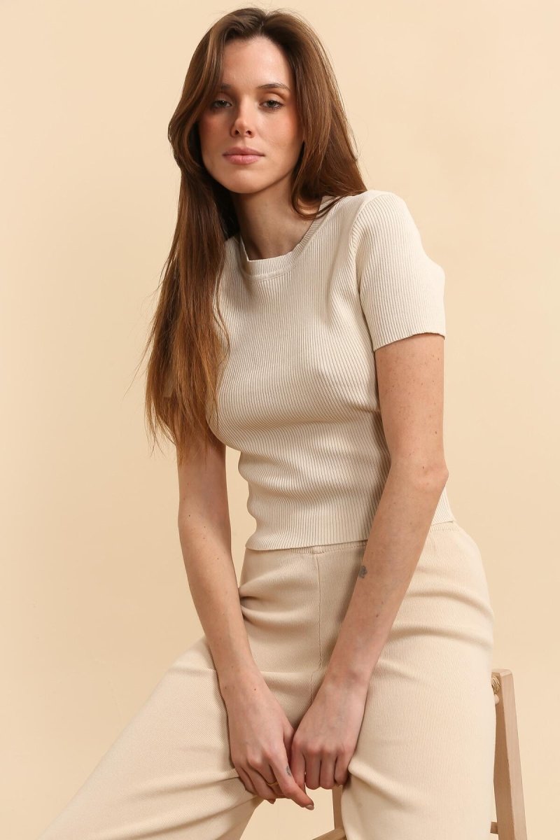 Ensemble deux pièces en maille beige - pull manche courtes et pantalon taille haute évasée - RIVE GAUCHE