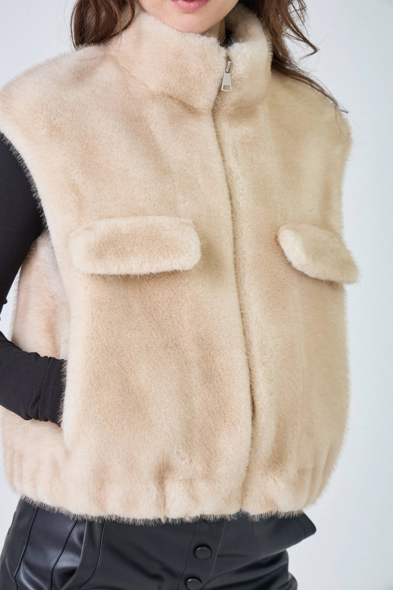 Gilet sans manches en fausse fourrure beige avec poches plaquées - RIVE GAUCHE