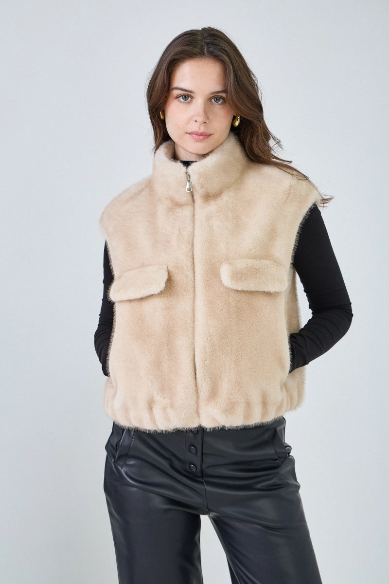 Gilet sans manches en fausse fourrure beige avec poches plaquées - RIVE GAUCHE
