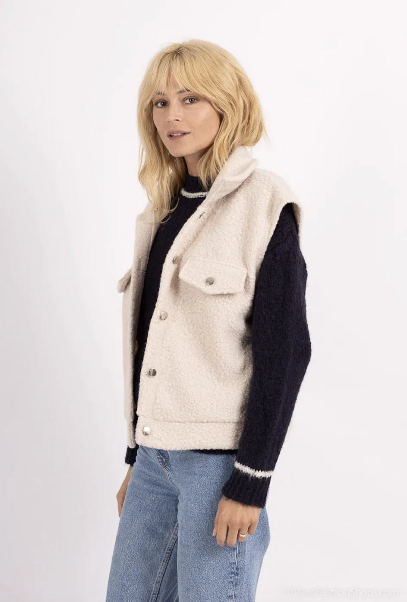 Gilet sans manches en moumoute écru avec poches à rabat - RIVE GAUCHE