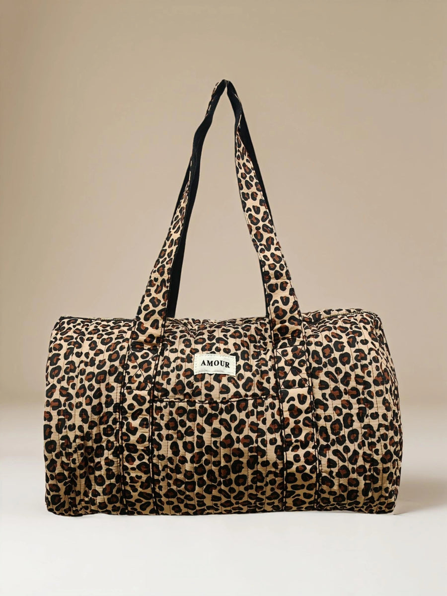 Sac week - end polochon léopard matelassé porté épaule en coton imprimé AMOUR - RIVE GAUCHE