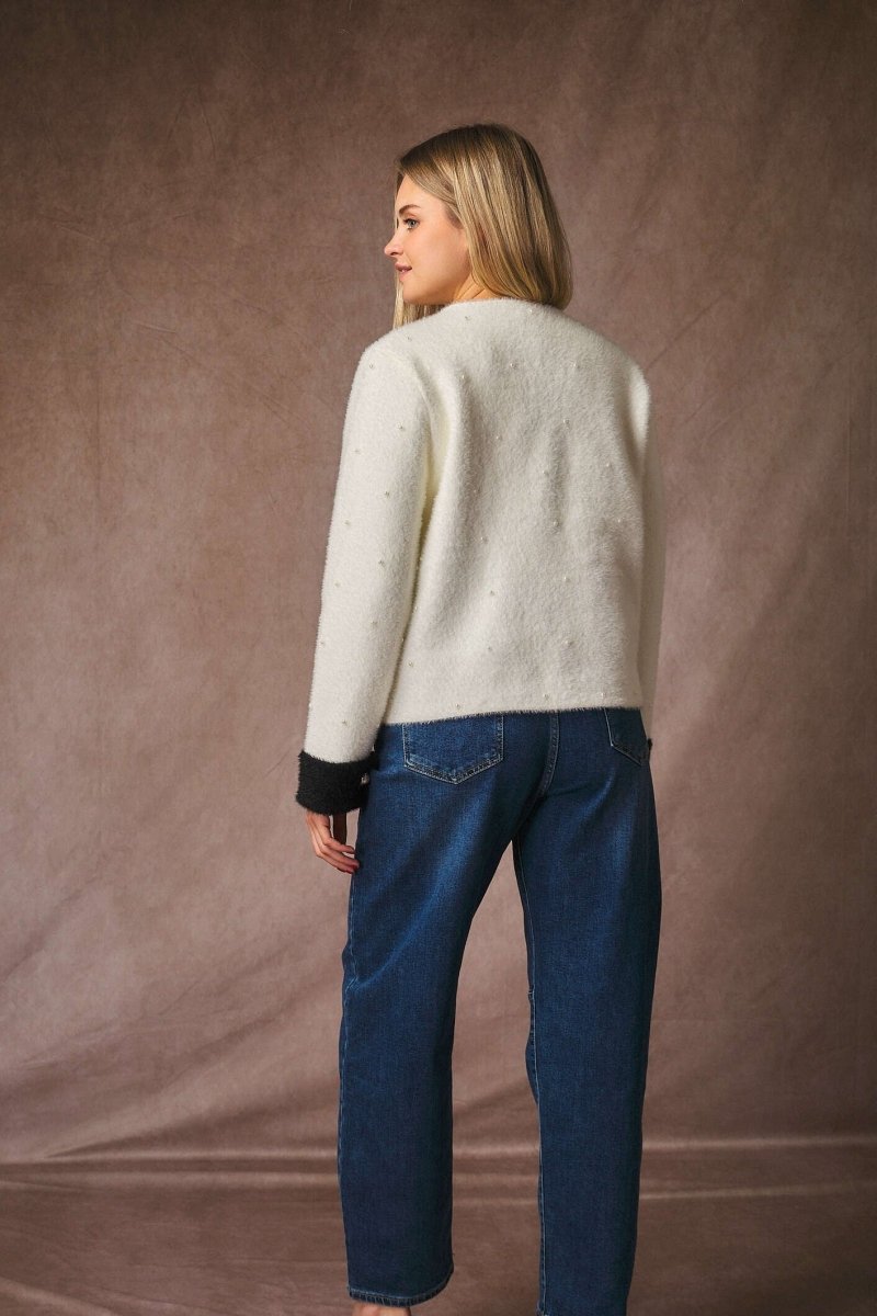 Veste en fourrure douce blanche à détails perlés - RIVE GAUCHE