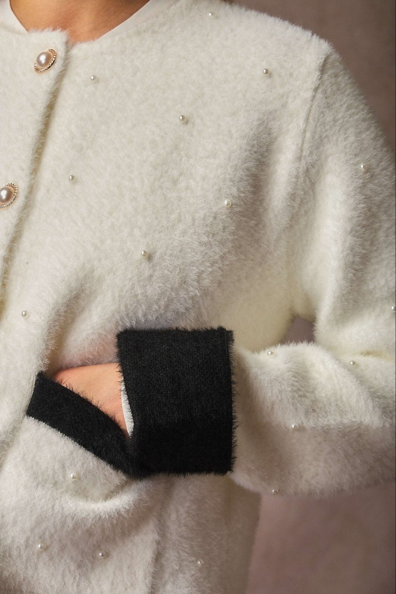 Veste en fourrure douce blanche à détails perlés - RIVE GAUCHE