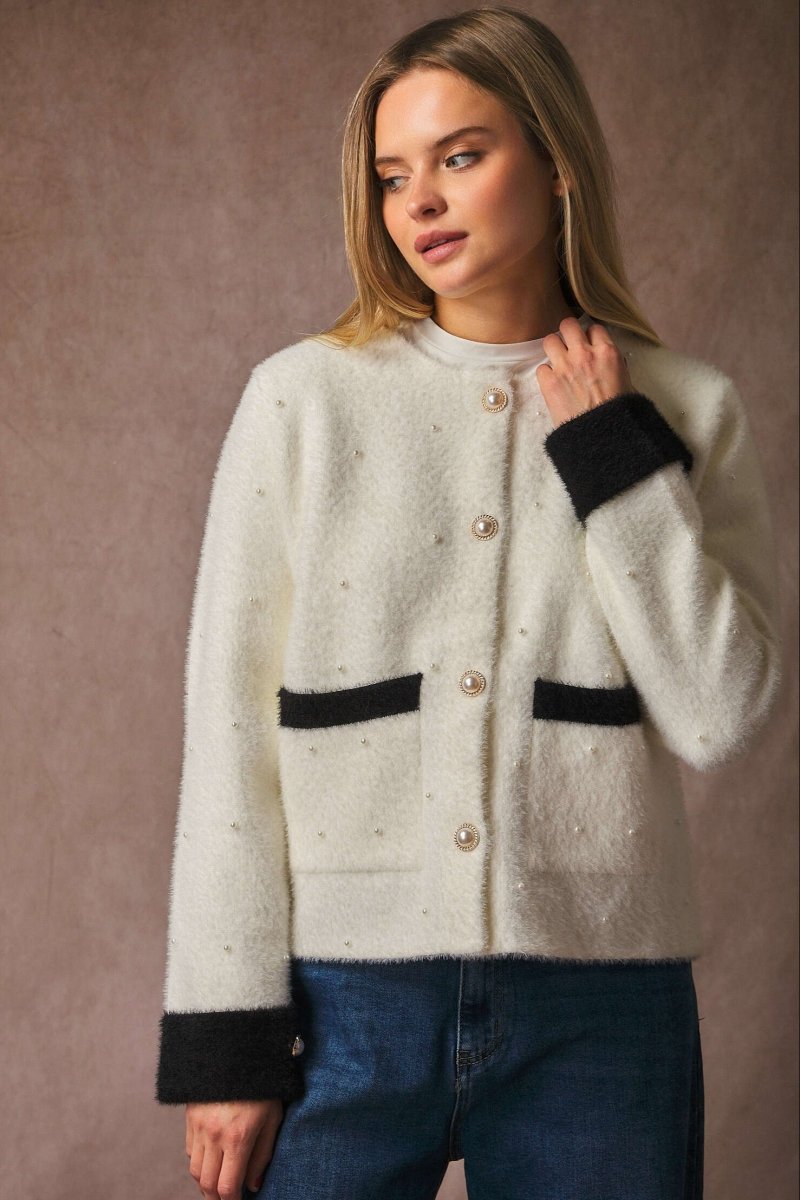 Veste en fourrure douce blanche à détails perlés - RIVE GAUCHE