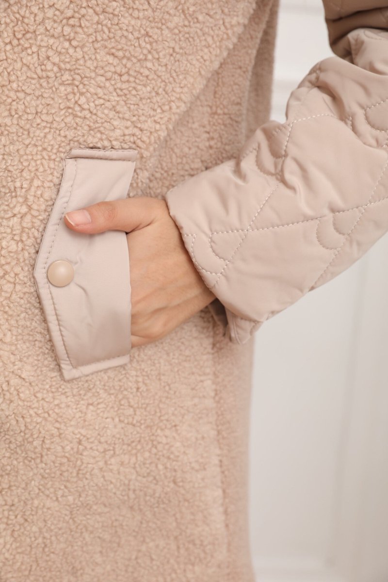 Veste matelassée beige avec capuche en fourrure d’agneau - RIVE GAUCHE