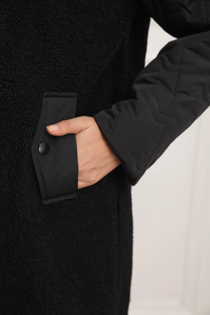 Veste matelassée noire avec capuche en fourrure d’agneau - RIVE GAUCHE