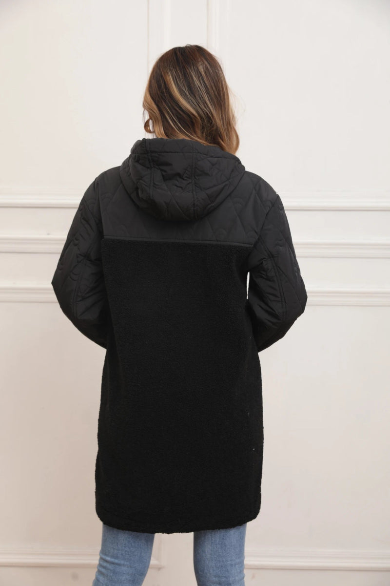 Veste matelassée noire avec capuche en fourrure d’agneau - RIVE GAUCHE